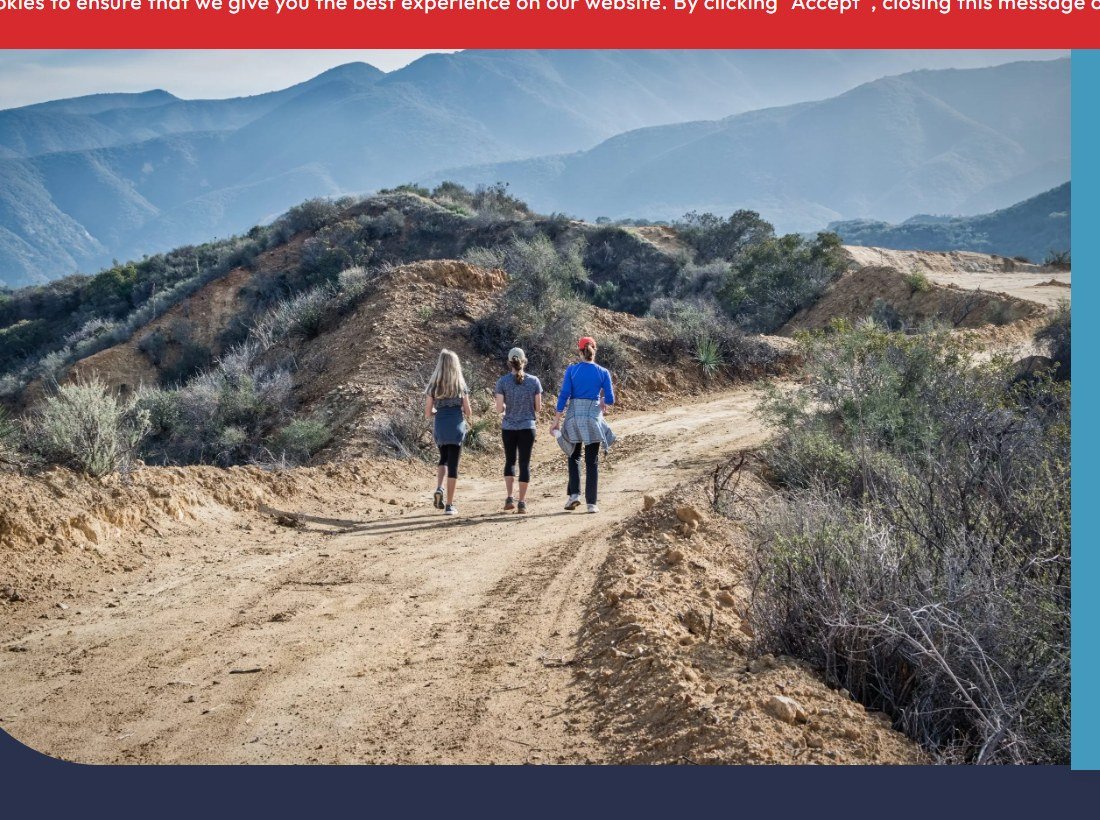 Travelers hiking a mountain trail